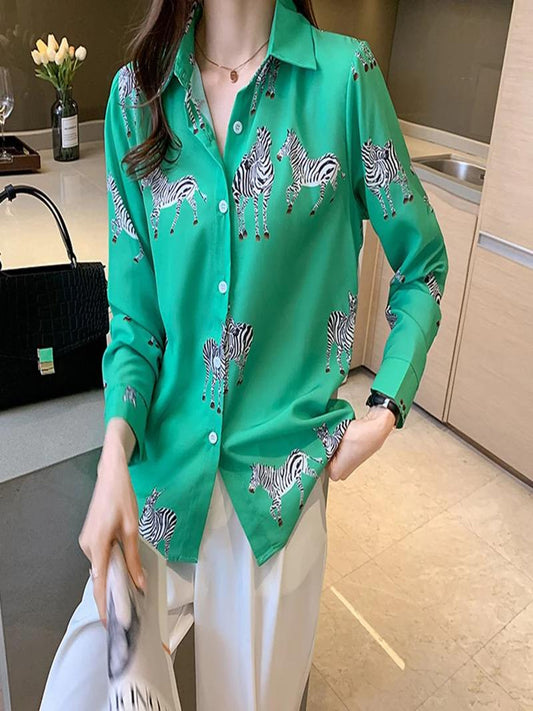 A girl wearing green zebra print shirt