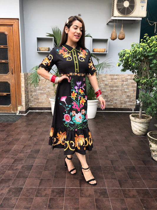 A woman wearing digitally printed floral dress