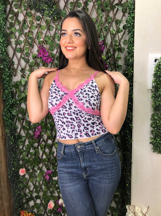 a girl wearing pink cheetah knit top