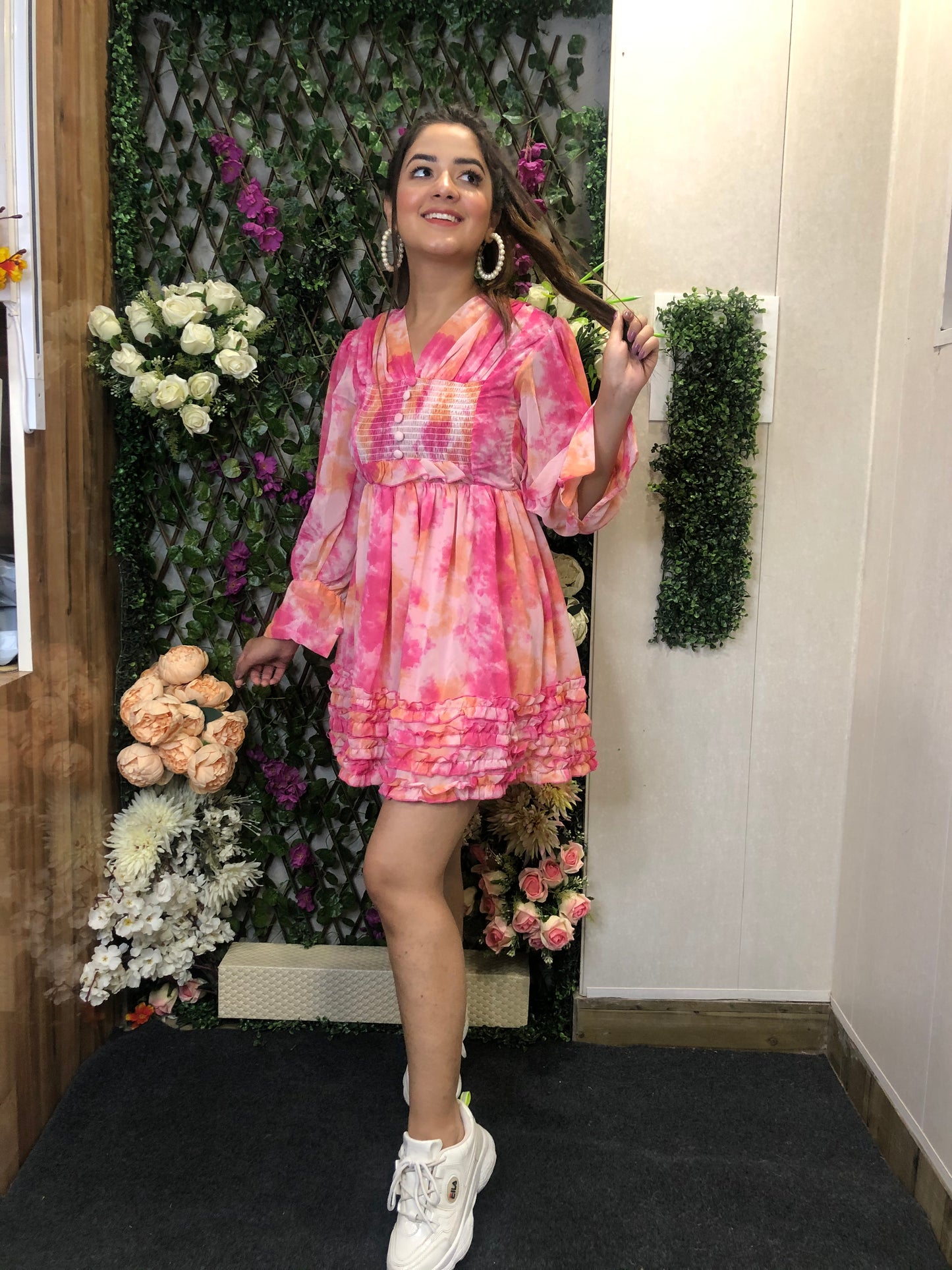 a girl wearing pink cute midi dress