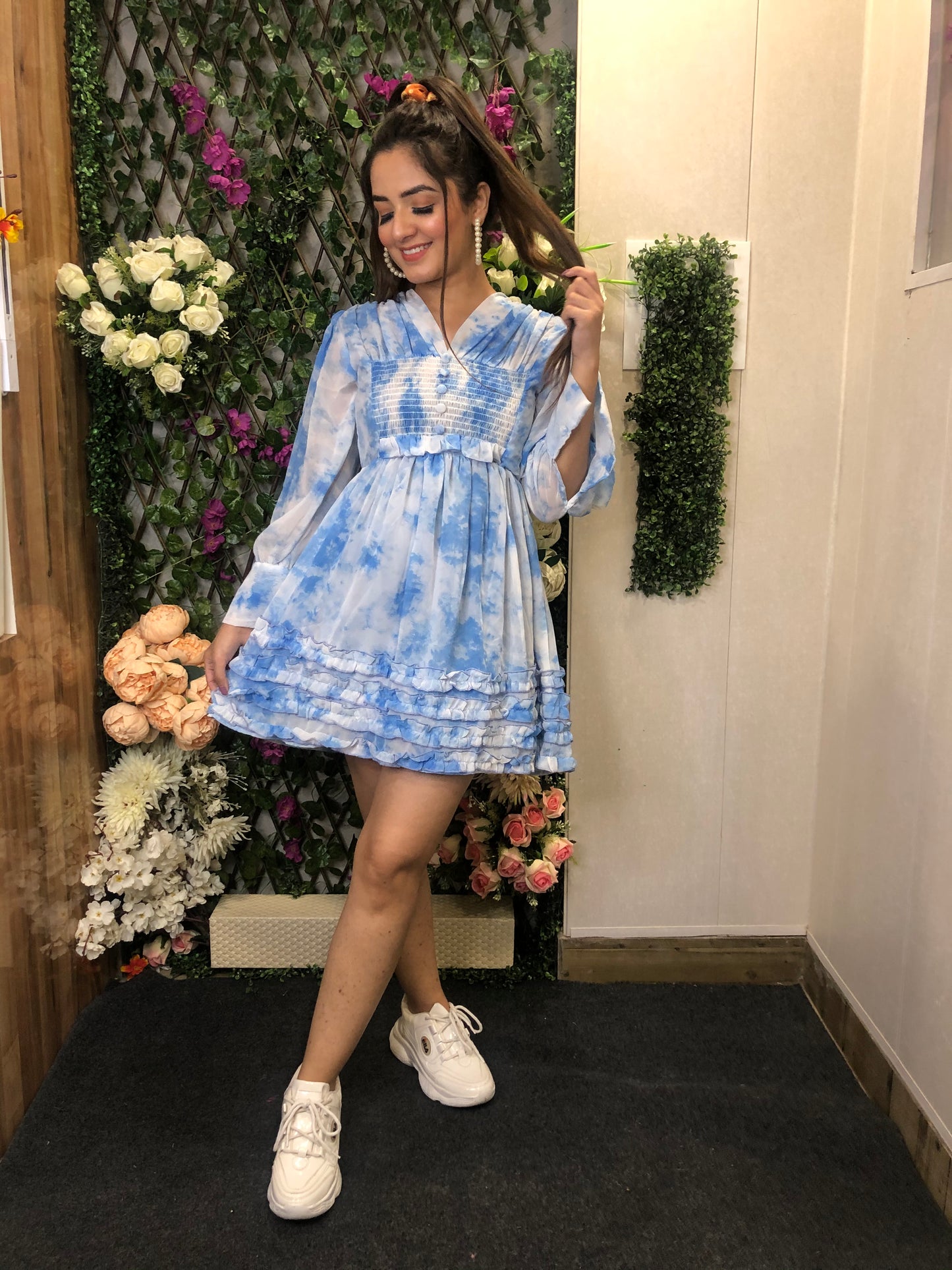 a girl wearing light blue cute midi dress