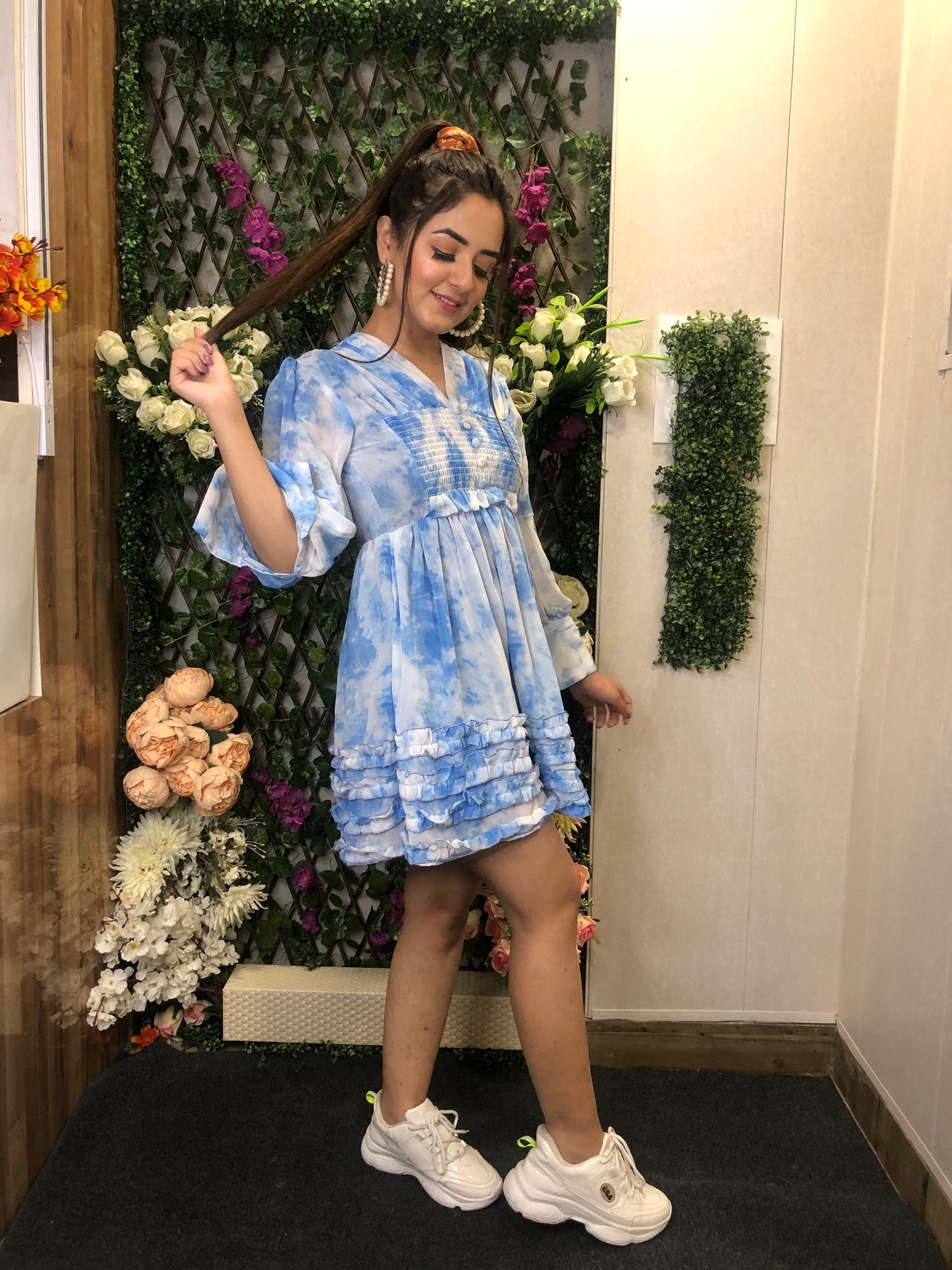 a girl wearing light blue cute midi dress